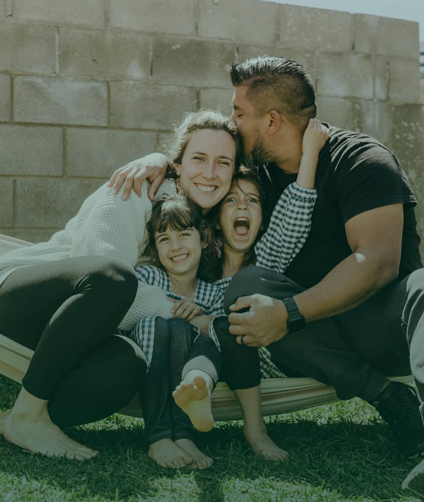 Foster family enjoying quality time outdoors, highlighting the importance of fostering care and supp.